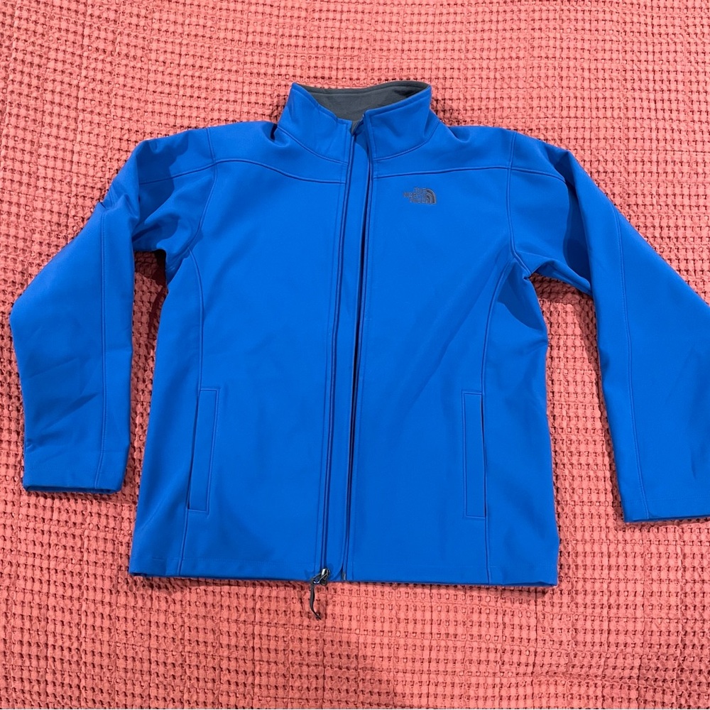 The North Face Blue Raincoat with Stand-Up Collar